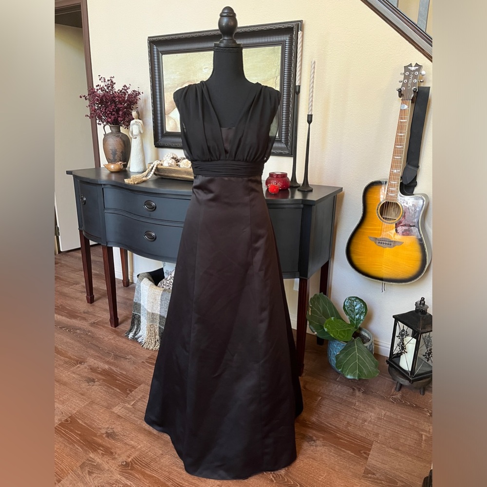 Elegant Formal- Black w/ sheer accents, boning to accentuate the waist.
